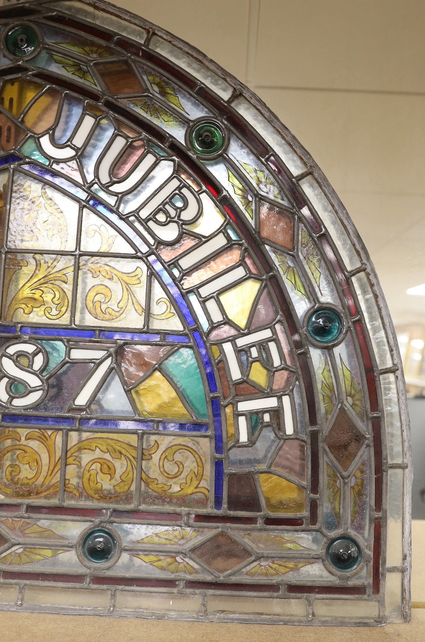 'Year of Jubilee 1887', a Victorian commemorative arched stained glass window, 67x86cm